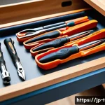 가정용 공구 세트 추천 - A compact, neatly organized toolset case open on a wooden workbench in a bright modern Japanese apar...